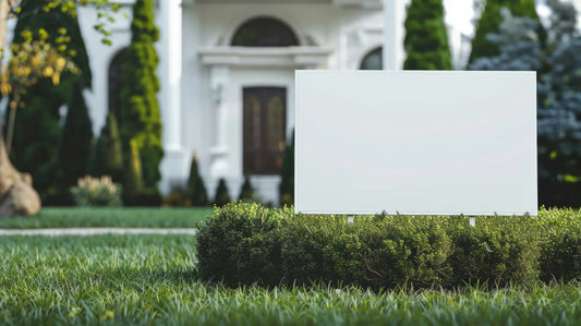 Blank yard sign on a green lawn